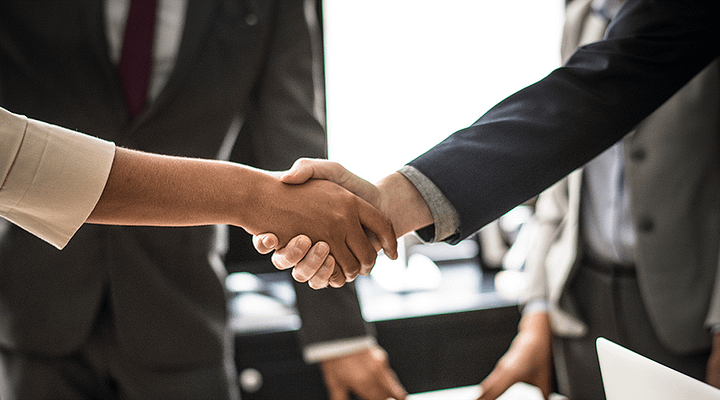 Business people hand shake
